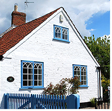 A distance shot of the exterior of Woodbine Cottage