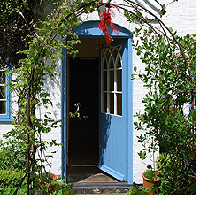 An application shot of the front entrance to Woodbine Cottage