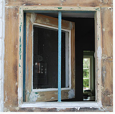 A stripped down window ready for painting